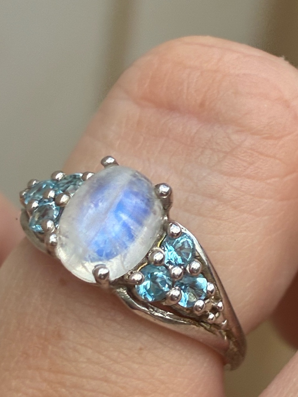 New with tags/solid sterling silver genuine moon stone/ blue topaz. TheRing